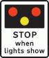 Light signals ahead at level crossing, airfield or bridge